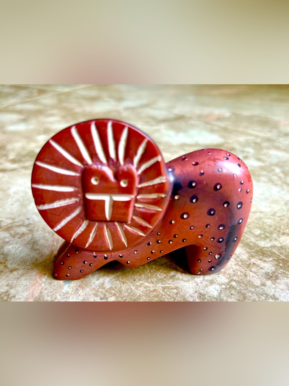 Hand Crafted Red Sunburst African Lion Soapstone Sculpture